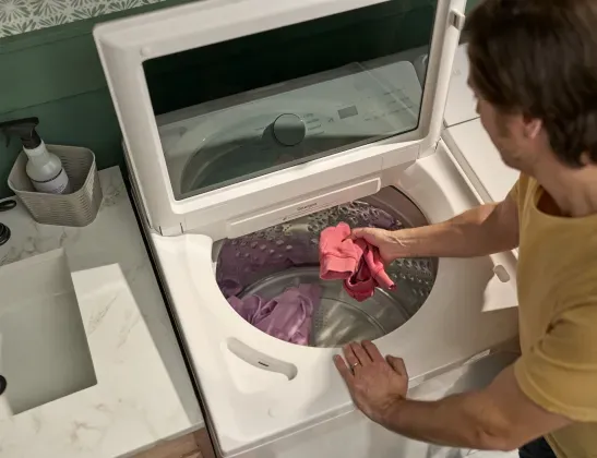 lg-top-load-washer-man-doing-laundry-top-view